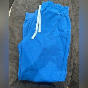 Figs high waisted royal blue jogger pants and scrub top.